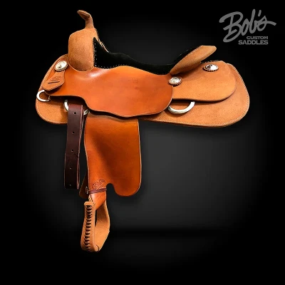 Equitation work saddle handcrafted for western performance, ranch work, and rider comfort.